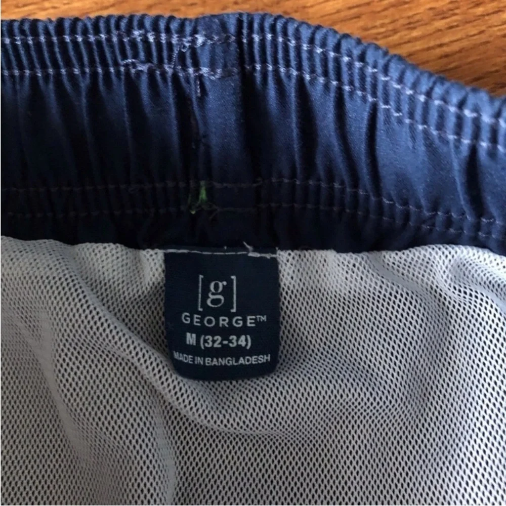 George blue swim trunks in size M (32-34)